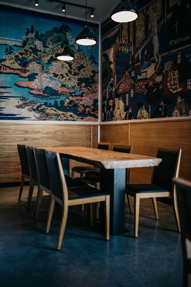 The dining room at Under Wraps with a hand-painted Japanese mural